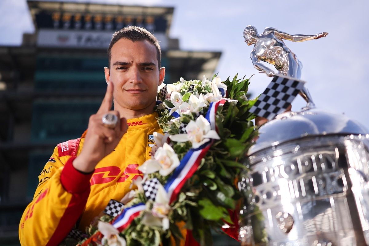 Alex Palou with Borg-Warner Trophy for winning the 2025 Indianapolis 500