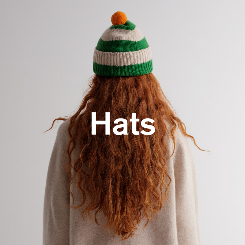"Hats" Model wearing a Jo Gordon pompom hat
