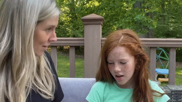 Couple hugging after receiving gift