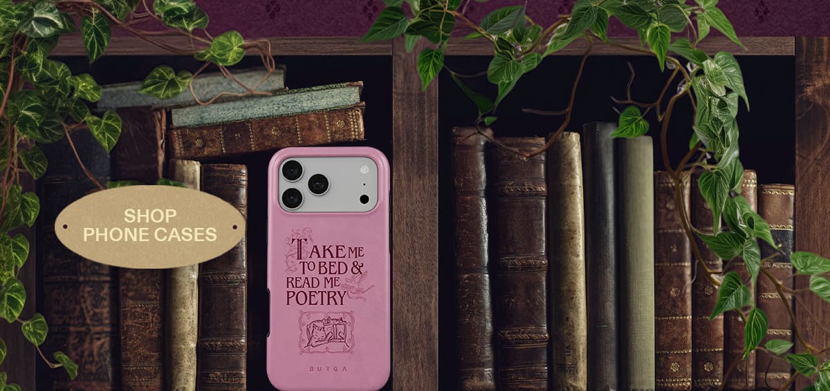 Decorative bookshelf displaying books, a pink phone case, and “Shop Phone Cases” sign.