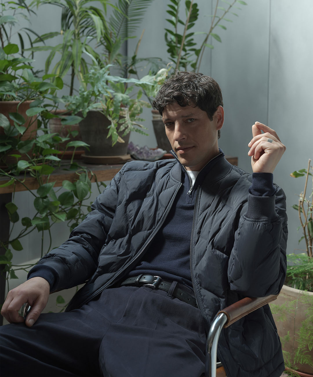 cestria navy padded jacket with navy merino wool jujmper and twill trousers