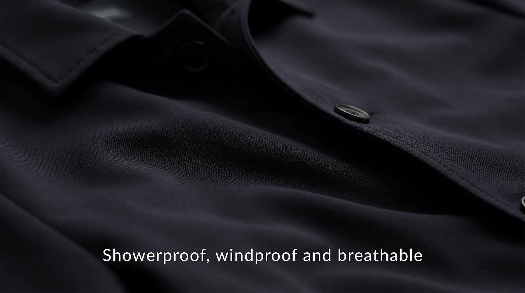 an image of a close up of a shirt with a button on it