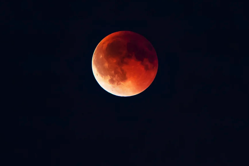 Total lunar eclipse shows the moon turned a red color