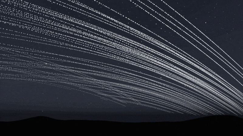 An animation showing streaks of white light moving across the night sky, obscuring the stars.
