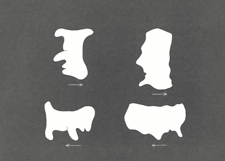 Four white glob-like figures on a dark gray background