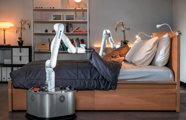 A pair of robotic arms on both sides of a bed, moving the comforter