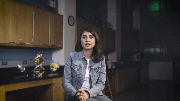 A GIF of a video interview with Samagya Banskota in a lab setting.