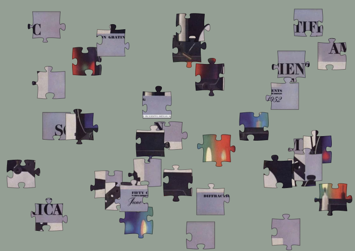 Puzzle pieces scrambled on a grey background, that when assembled depict the cover of Scientific American's May 1952 issue