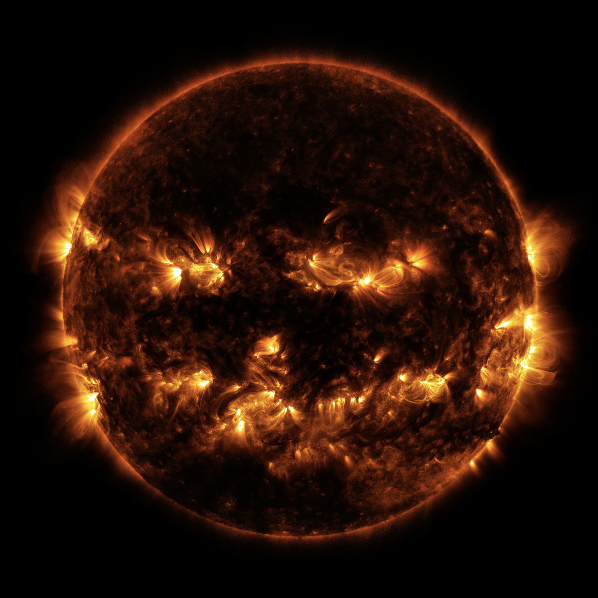 Active regions on the Sun combined to look something like a jack-o-lantern's face on Oct. 8, 2014