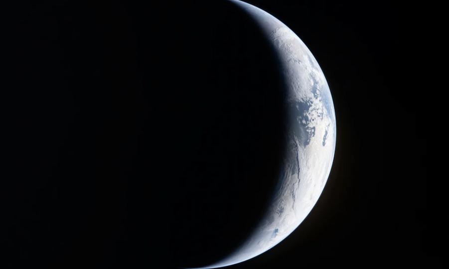 sunlit crescent view of the Earth