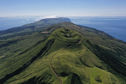 A hilly green landscape stretching into the distance