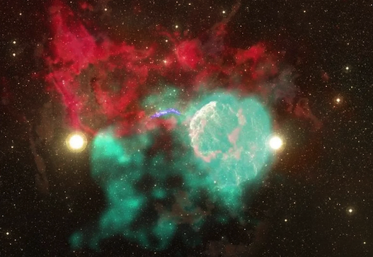 A large, red, irregularly shaped cloud sprawls across the upper half of the image. A turquoise cloud blooms at center, punctuated by bright stars and bursts of gas and dust.