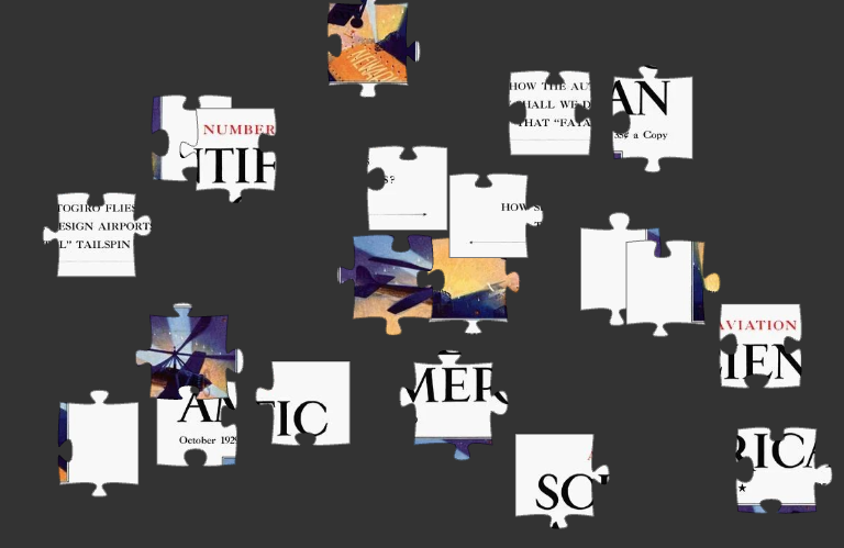 Black, white and orange puzzle pieces arrayed on a black background