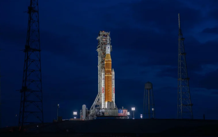 Lights illuminate NASA's Artemis II SLS (Space Launch System) rocket and Orion spacecraft at Launch Complex 39B at NASA's Kennedy Space Center in Florida on Sunday, Jan. 18, 2026.