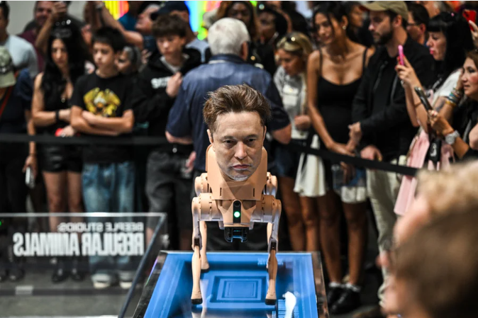A photo of a wax head of Elon Musk is seen on a robot dog as a part of an art installation called "Regular Animals" by digital artist Mike Winkelmann, also known as Beeple, during Art Basel 2025 at Miami Beach Convention Center in Miami Beach, Florida, December 7, 2025