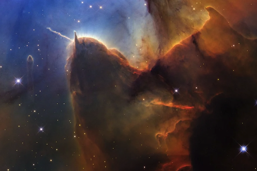 Brown and red gas billow in a stellar nursery