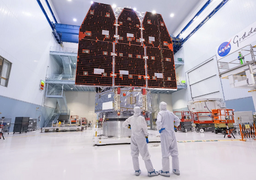 A clean room at Goddard Space Flight Center, technicians view the Goddard-built $4.3-billion Nancy Grace Roman Space Telescope shortly before its launch.