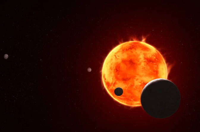 Illustration of a star with multiple flares and four small orbiting planets. Star is off center to the lower right, with a silhouetted planet to its lower right. A smaller planet is shown an inch to the left, also silhouetted. A third planet is directly to the left of the star, gray and white but without much detail, and farther out near the left edge of the image is the fourth planet, also gray with little detail