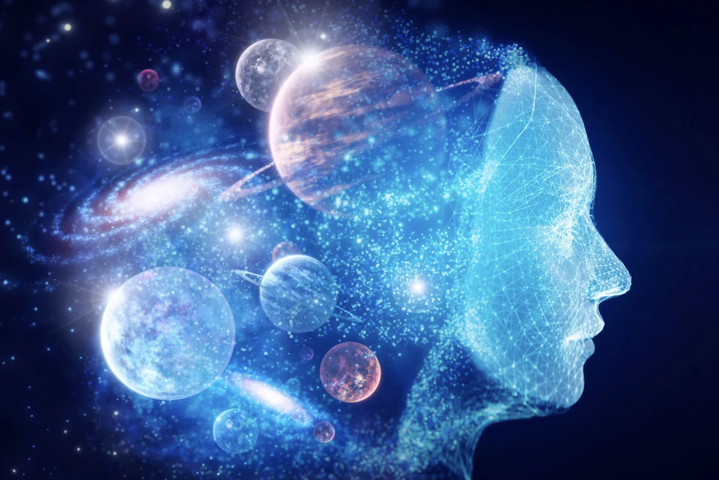 A creative illustration of a human head blended in with planets in our solar system