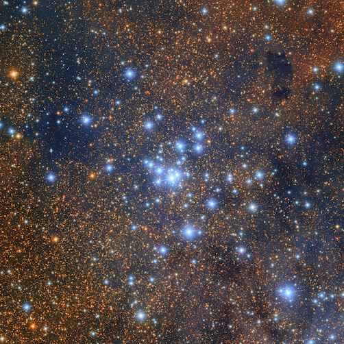 Dense starfield with bright nebulae and faint galactic haze