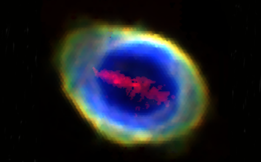 A ring-shaped cloud of blue and yellow gas. At the center is a straight line of red cloud, indicating the presence of iron.