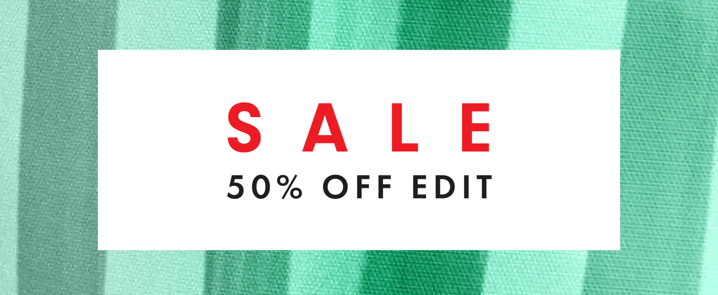 Sale – 50% Off Edit, on a green striped fabric background
