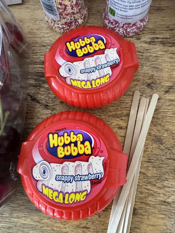 Hubba Bubba and sprinkles arranged as Sprinkles shoot props