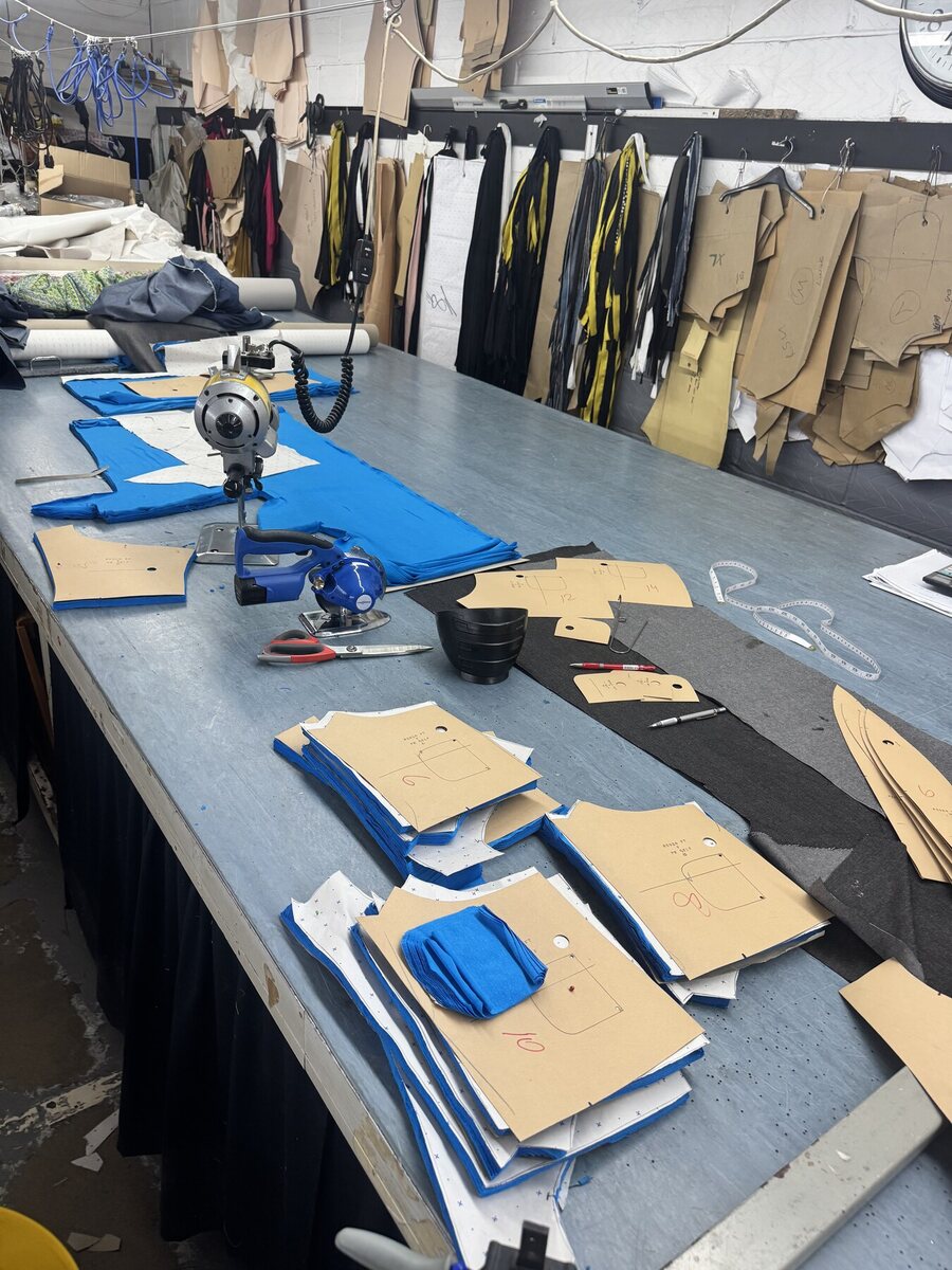 Sprinkles paper patterns laid out across the cutting table
