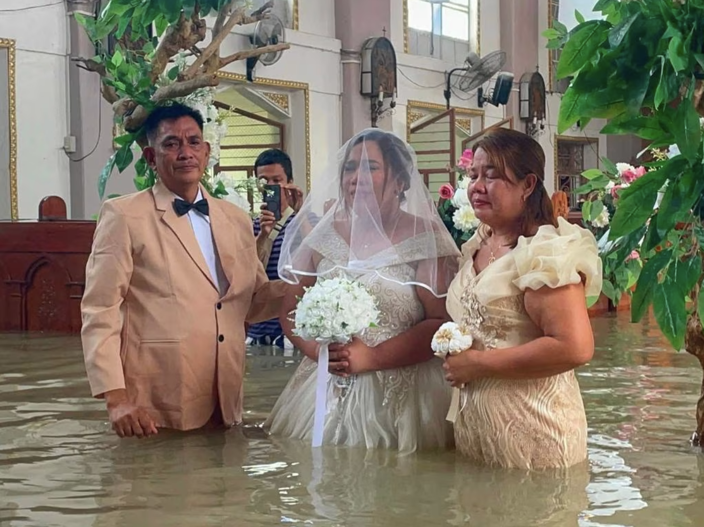 Gilbert and Liean Liza Chico marry amid the Bulacan floodwaters