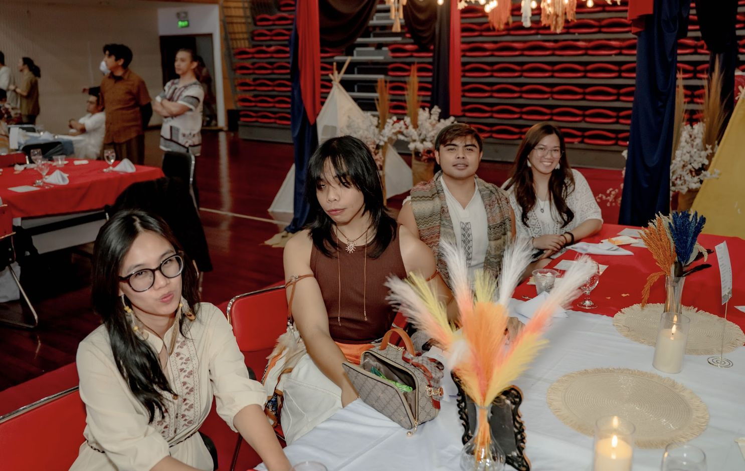 REassist employees at their tables during the 11th anniversary celebration