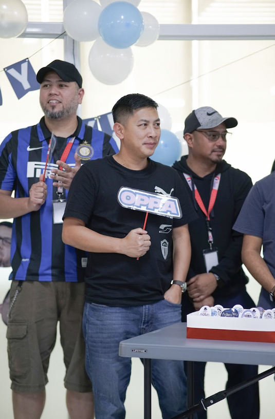 Team holding signs