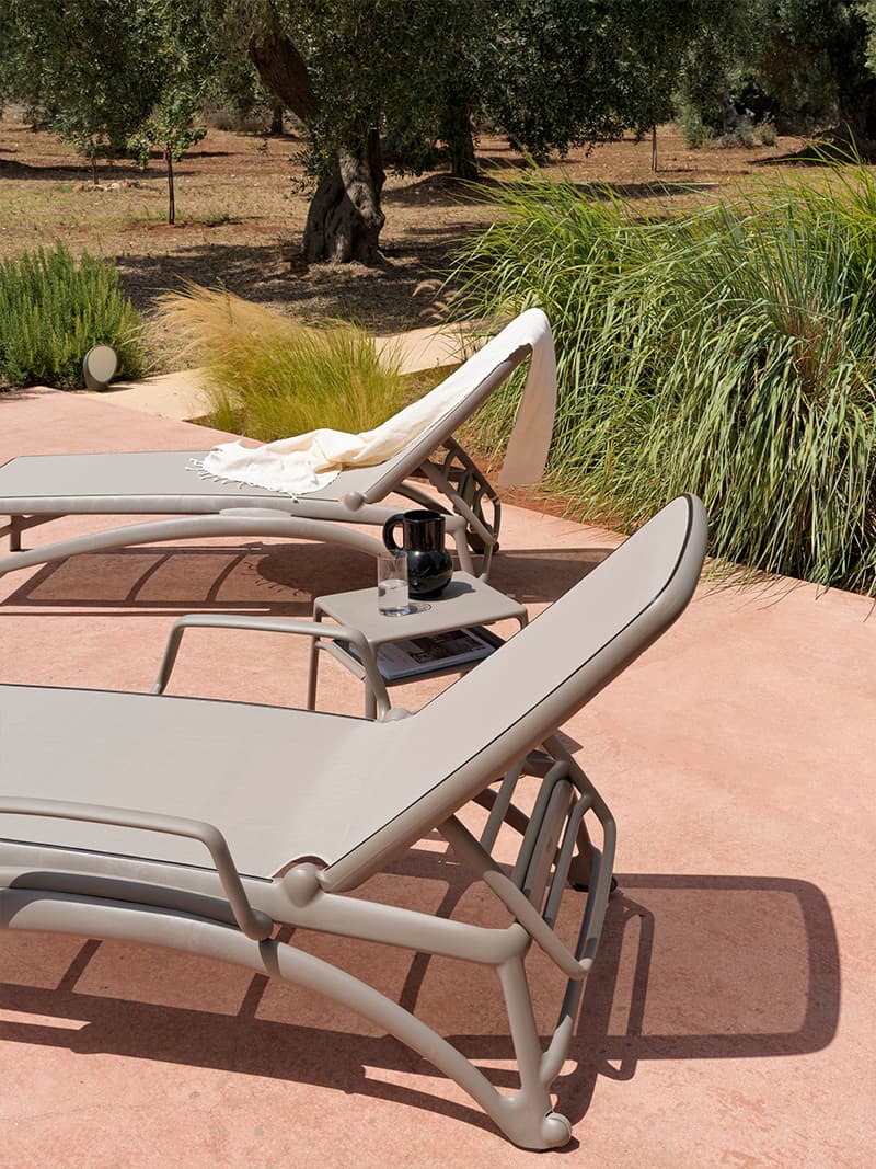 Nardi sun lounges by the pool