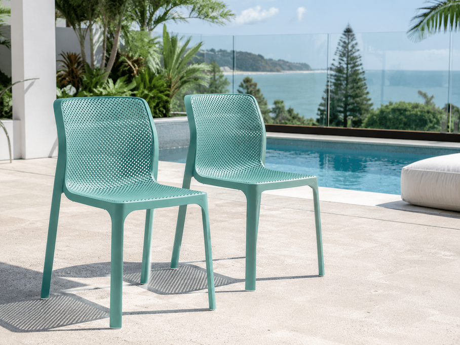 Nardi chairs in bold colour arranged poolside showing UV colour retention in Australian conditions