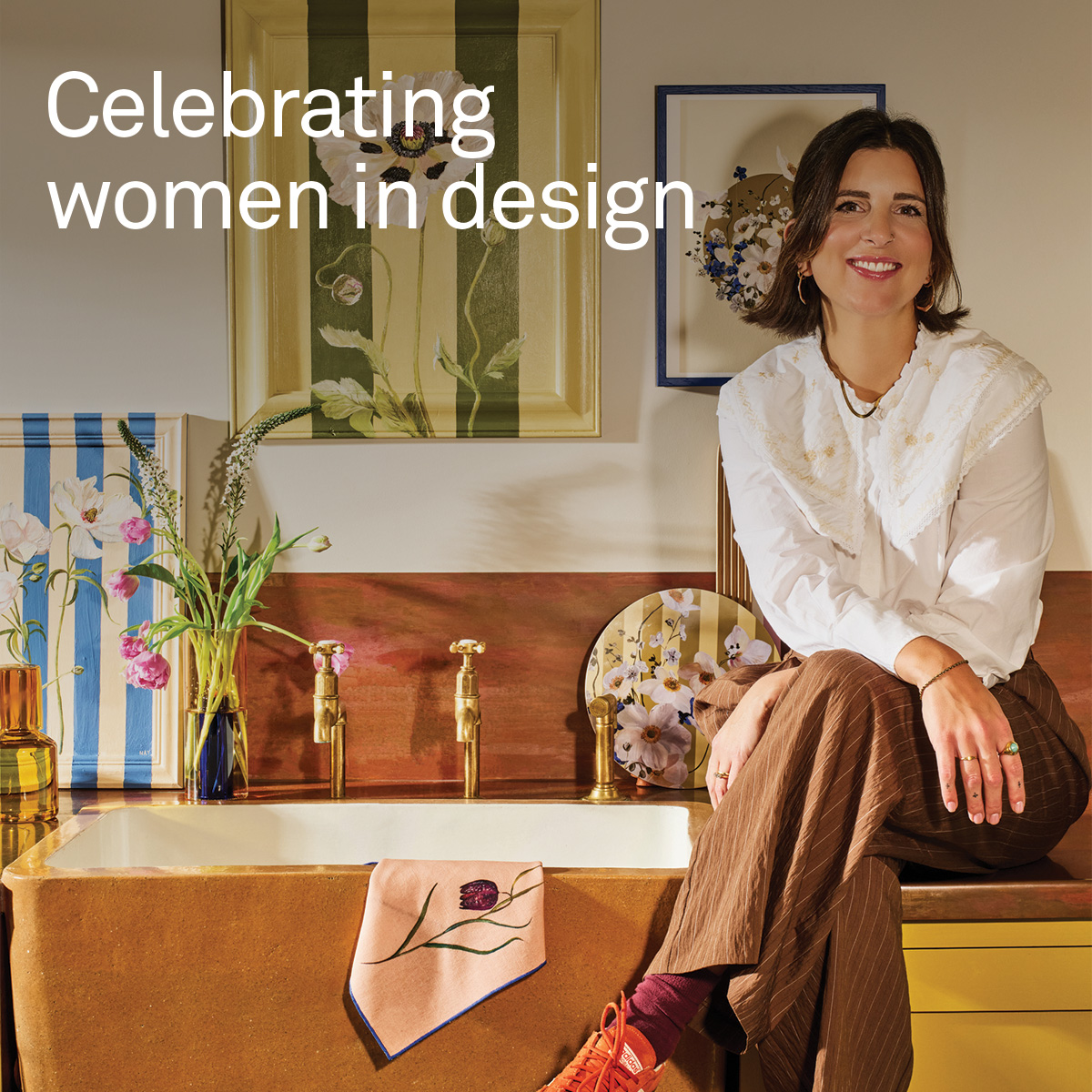an image of a woman sitting on a counter in a kitchen