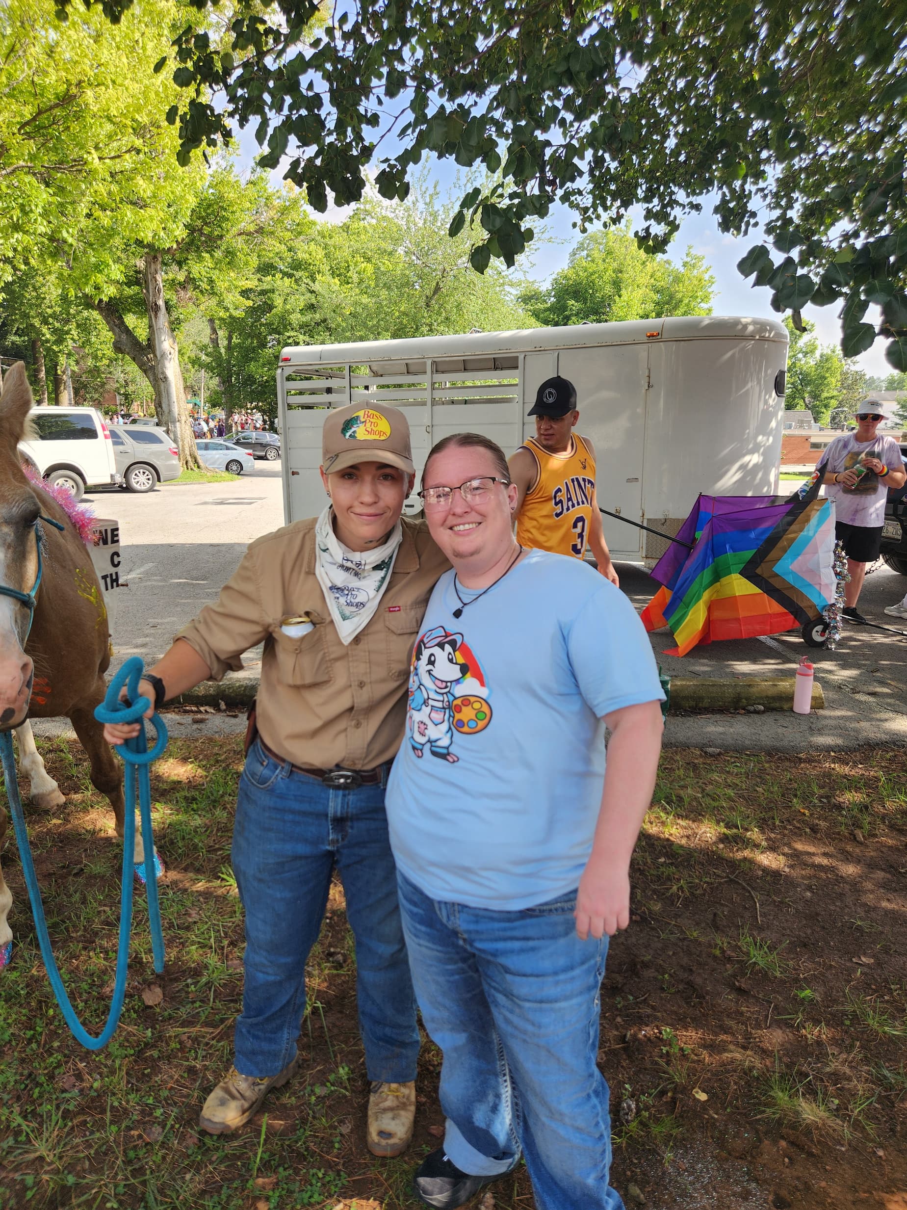 Image from Pride weekend 2026 with Brandyn Gallagher and Mercedes Chandler standing beside a glitter-toed horse Image from Pride weekend 2026 with Brandyn Gallagher and Mercedes Chandler standing beside a glitter-toed horse