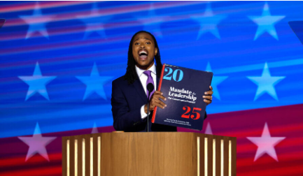 Malcolm Kenyatta with Project 2025 playbook to the DNC stage