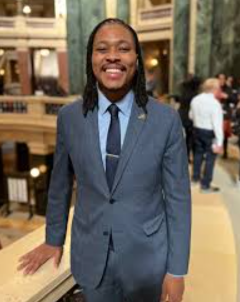 Malcolm Kenyatta posing for a photo