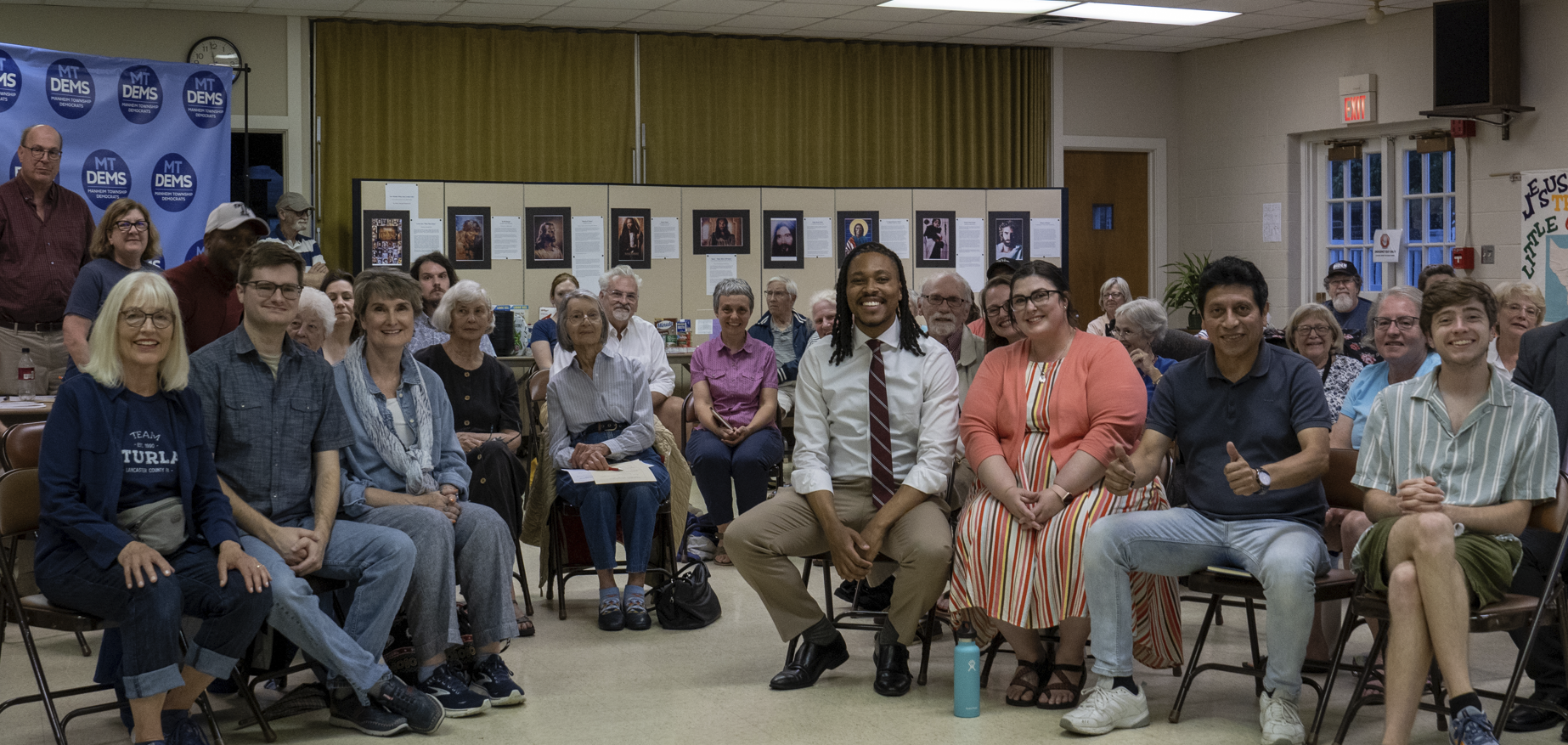 Malcolm Kenyatta posing for a photo with Pennsylvanian voters.