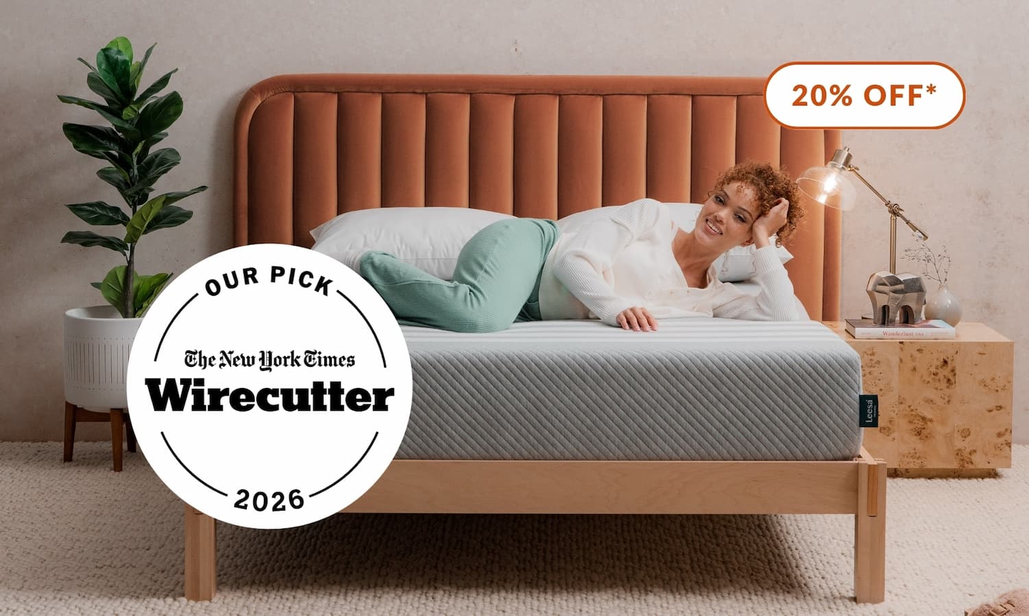 Woman lying on Wirecutter's pick for Best Memory Foam Mattress, the Original