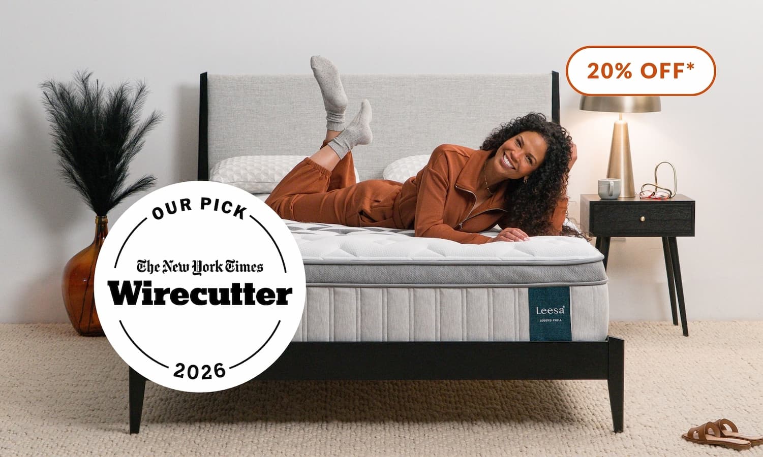 Woman lying on Wirecutter's pick for Best Hybrid Mattress, the Legend Chill Hybrid