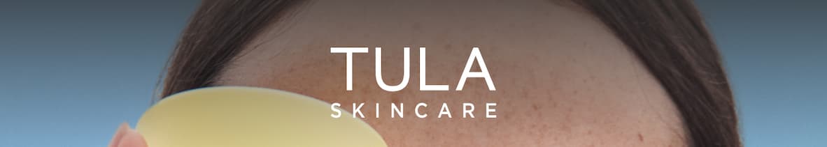 an image of a woman holding a yellow comb in her hand