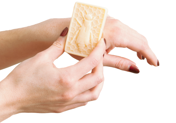 IMAGE: Hand holding Hand Cream Bar
