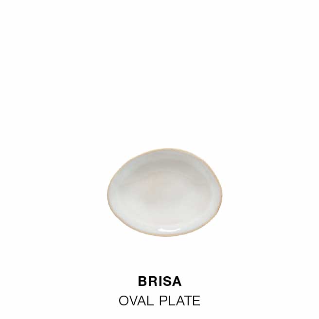 Dining room table with Brisa dinnerware in salt white, bowl with glass bottle and dried flowers, and round wooden table set with plates, bowls and Maria linen napkins in white, with text For a cozy meal indoors, followed by salad dessert plate, soup cereal bowl and oval plate in Brisa