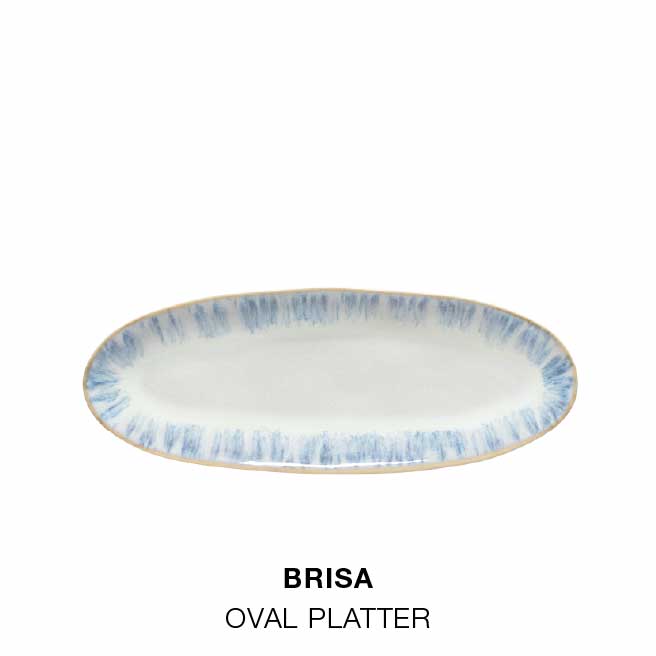 Porch table with Brisa dinnerware in ria blue, bowl and dish with coarse salt and herbs, oval platter with a sprig of lavender, and table set with plates, bowls and wine glasses on a blue tablecloth, with text For lunch on the porch, followed by dinner plate, oval platter and oval bowl in Brisa