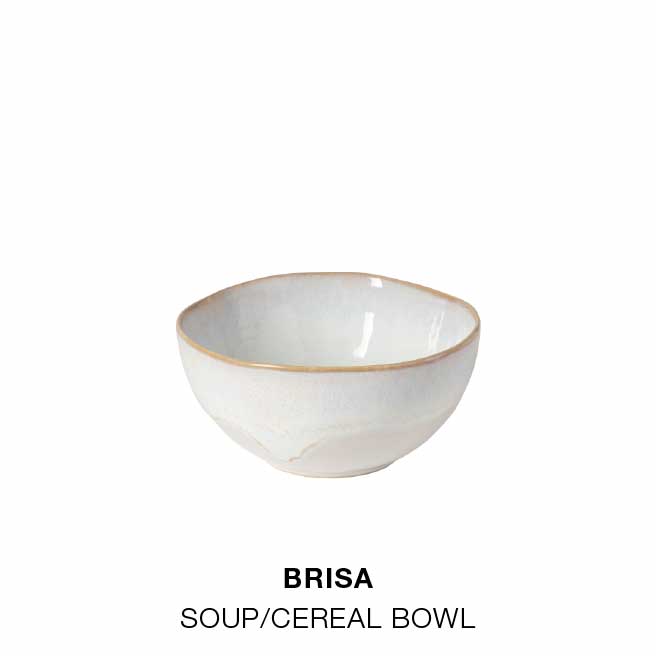 Dining room table with Brisa dinnerware in salt white, bowl with glass bottle and dried flowers, and round wooden table set with plates, bowls and Maria linen napkins in white, with text For a cozy meal indoors, followed by salad dessert plate, soup cereal bowl and oval plate in Brisa