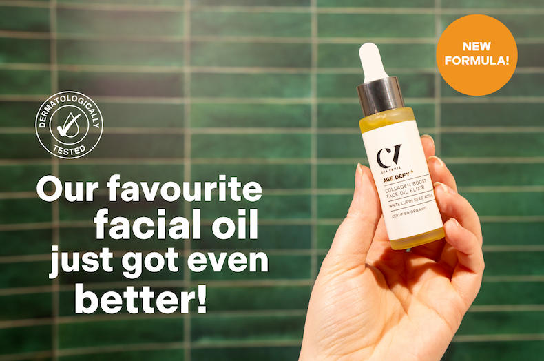 an image of a person holding a bottle of facial oil