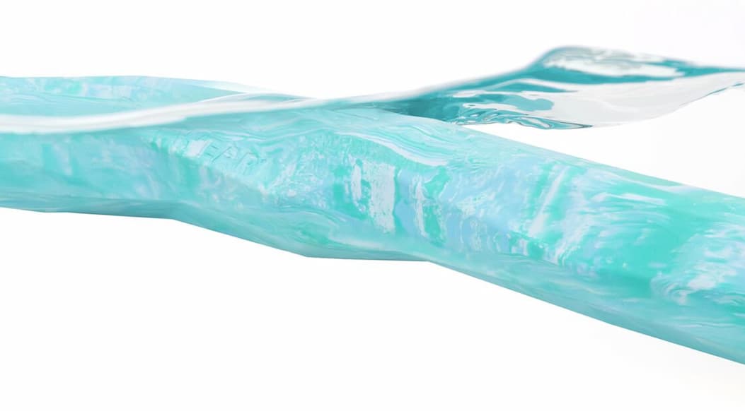 A Gnawt-A-Stick floats in the water.