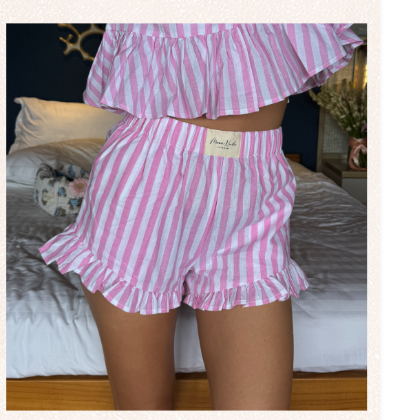 Pink and white striped pajama shorts.