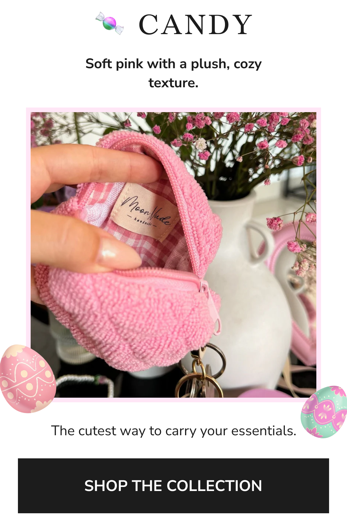 A soft pink pouch with a cozy texture, open to show its interior.