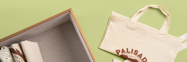 Organized totes in a Lined Acacia Bin